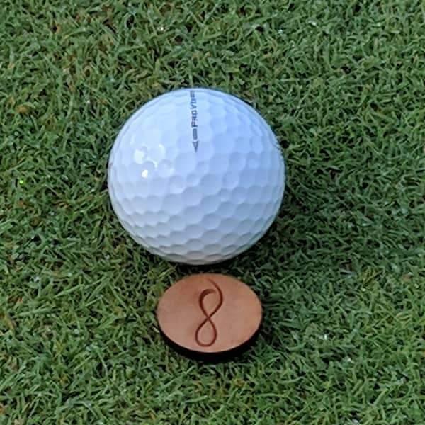 Cherry Wood Ball Marker on the Green