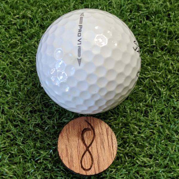 Mahogany Wood Ball Marker on the Green