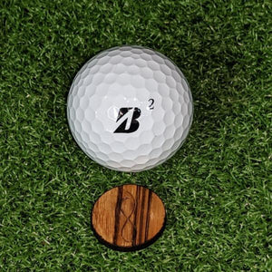 Zebrawood Ball Marker on the green